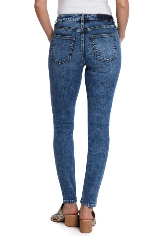 Shop Hint Of Blu Low Rise Skinny Jeans In Old Blue