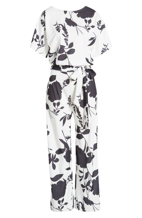 Shop Nikki Lund Lindsey Floral Tie Waist Jumpsuit In White/black Floral
