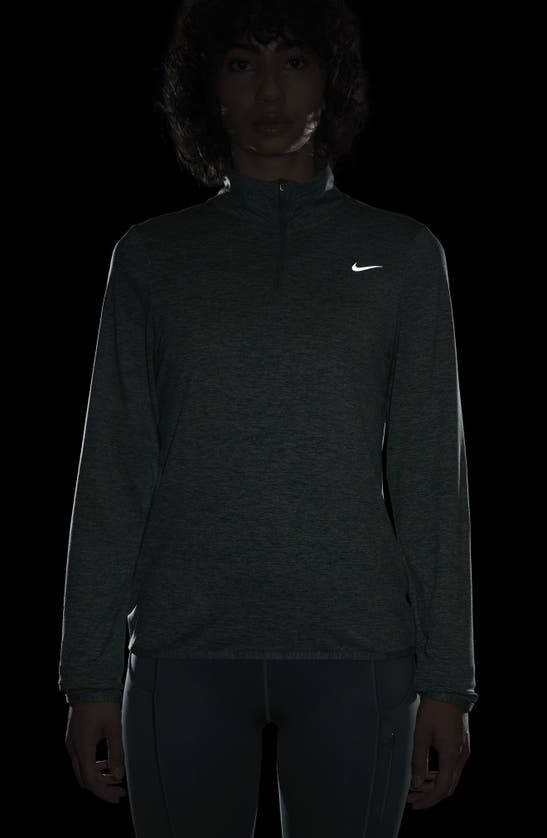 Shop Nike Dri-fit Swift Element Uv Quarter Zip Running Pullover In Bicoastal/enamel Green/heather