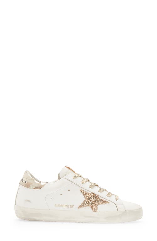 Shop Golden Goose Super-star Low Top Sneaker In White/gold