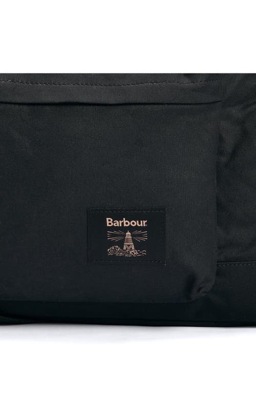 Shop Barbour Field Water Resistant Waxed Cotton Duffle Bag In Black