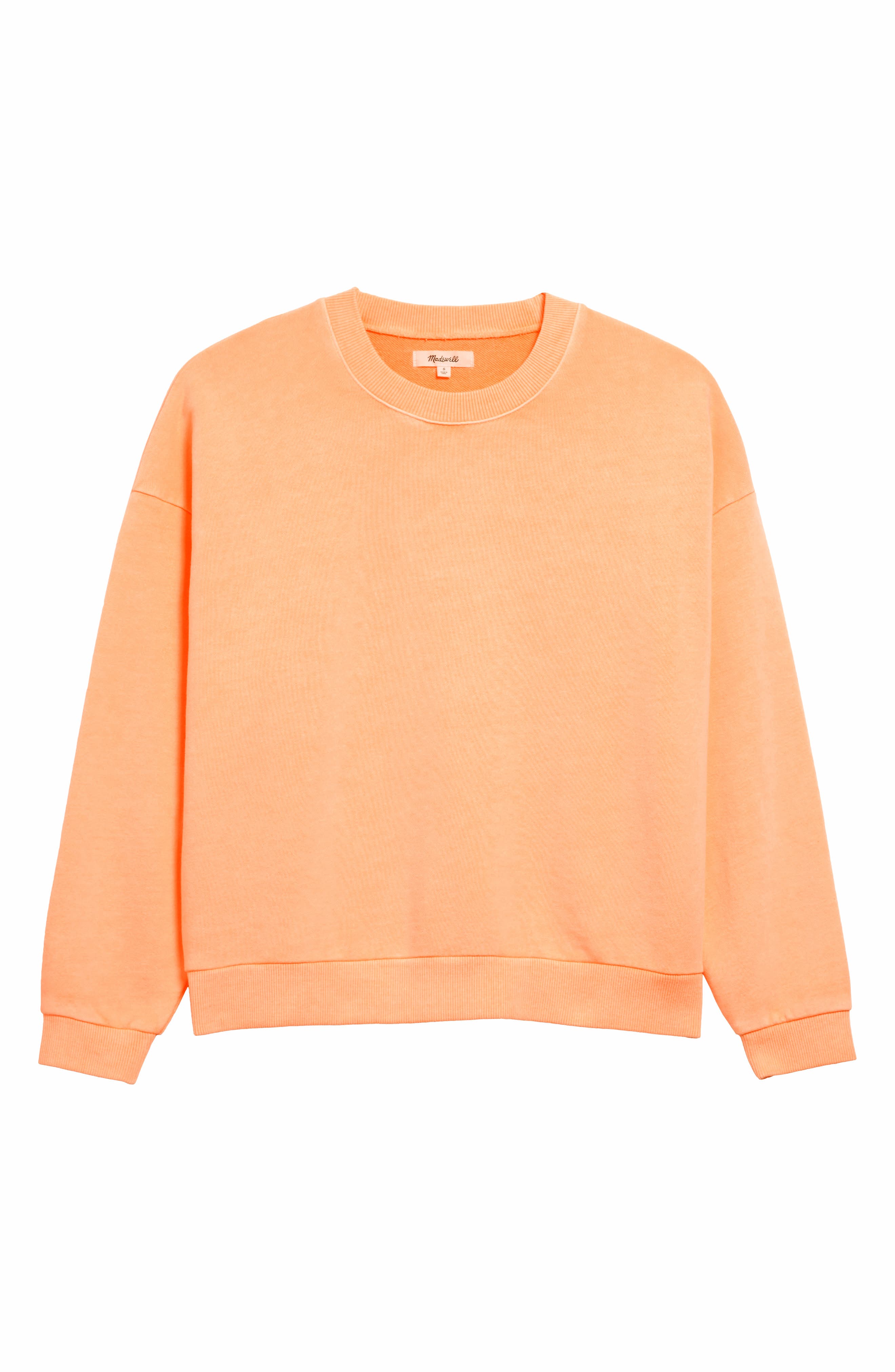 pastel orange sweatshirt