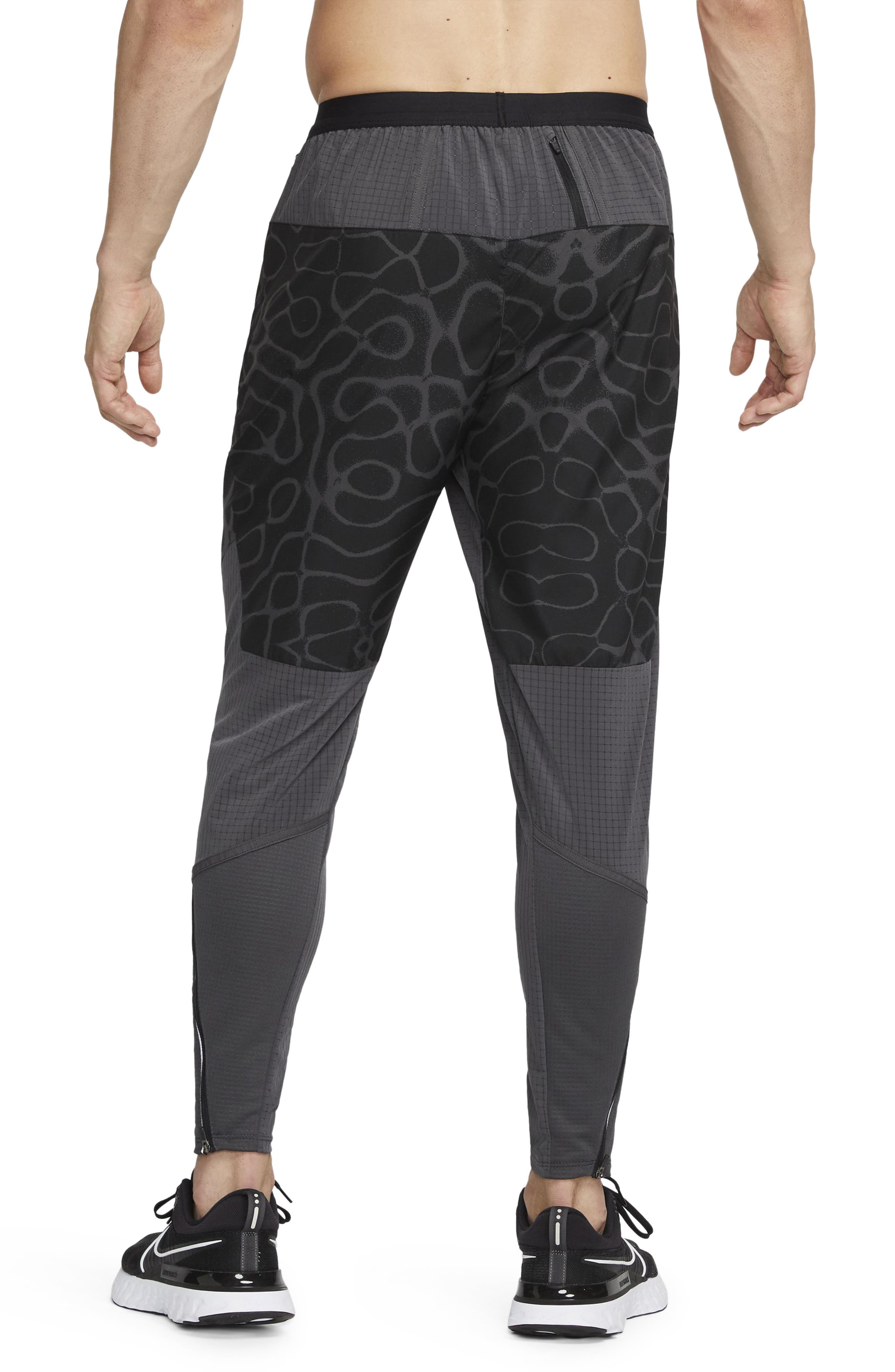 Nike Men's Dri-Fit Wild Run Phenom Elite Woven Graphic Running Pants in Black, Size: Large | DM4574-010
