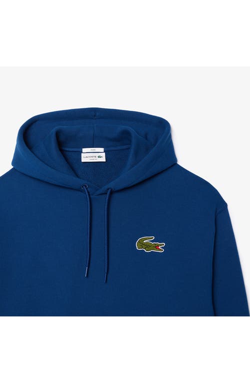 Shop Lacoste Loose Fit Cotton French Terry Hoodie In Globe