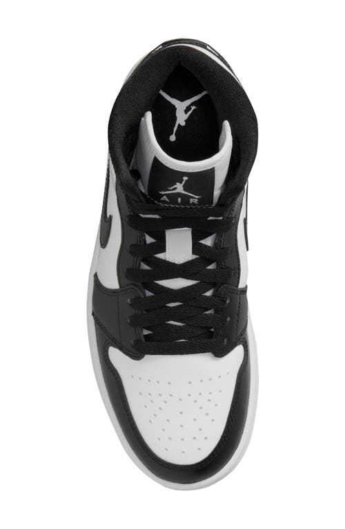Shop Jordan Air  1 Mid Basketball Sneaker In White/black/white