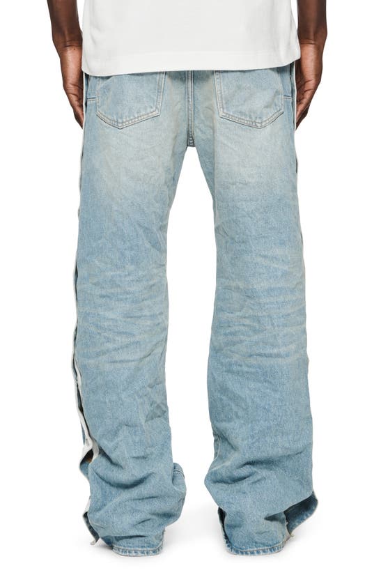 Shop Purple Brand Relaxed Teraway Straight Leg Jeans In Light Indigo