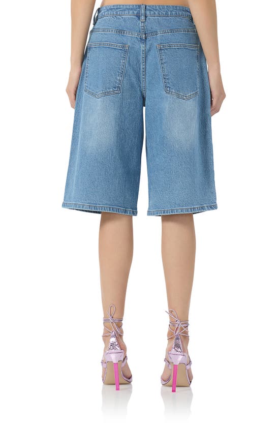 Shop Afrm Low Rise Denim Bermuda Shorts In South Pacific Wash
