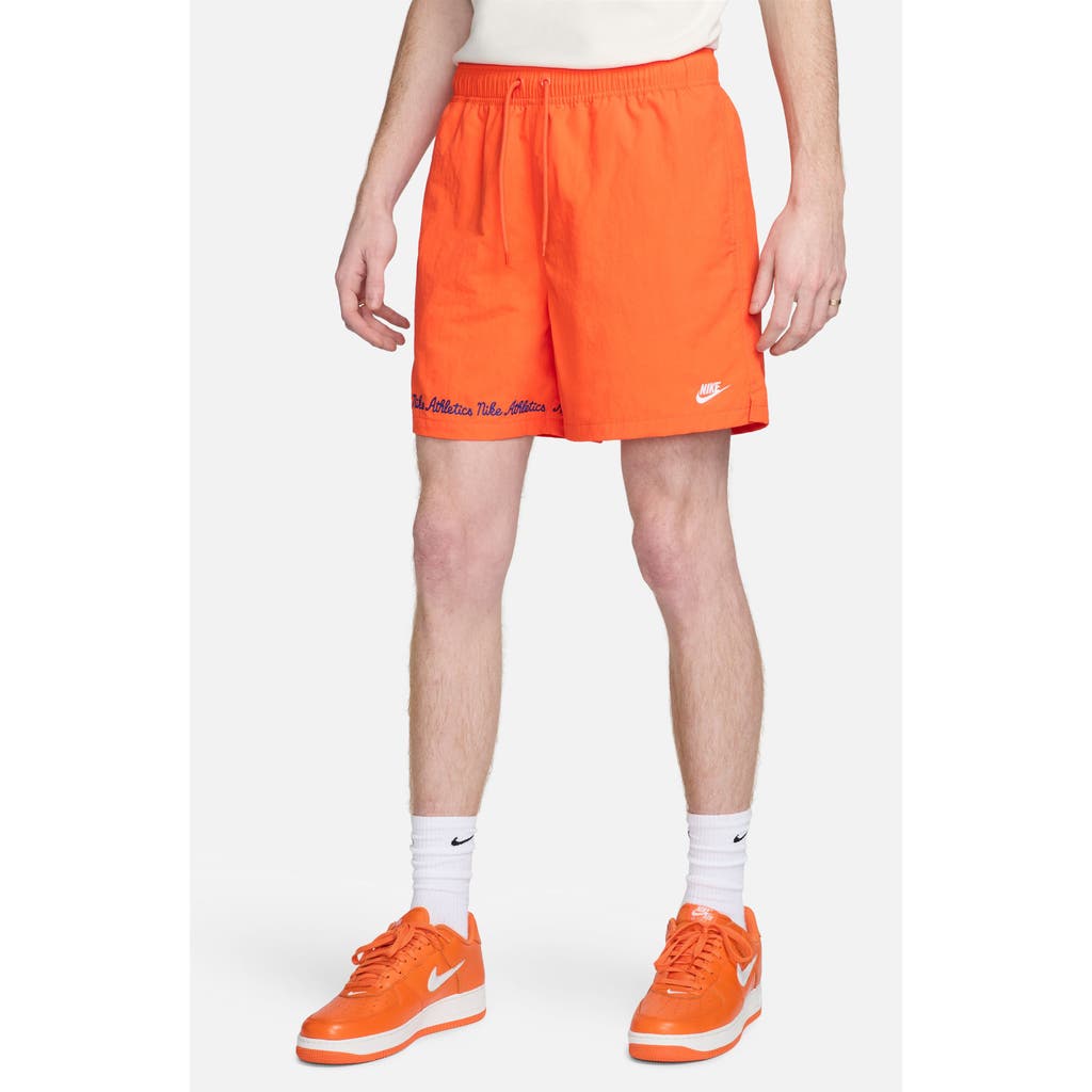 Nike Club Flow Embroidered Nylon Shorts In Safety Orange/white