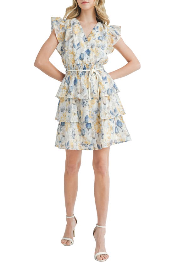 Mila Mae Floral Flutter Sleeve Tiered Minidress In Ivory Blue Floral