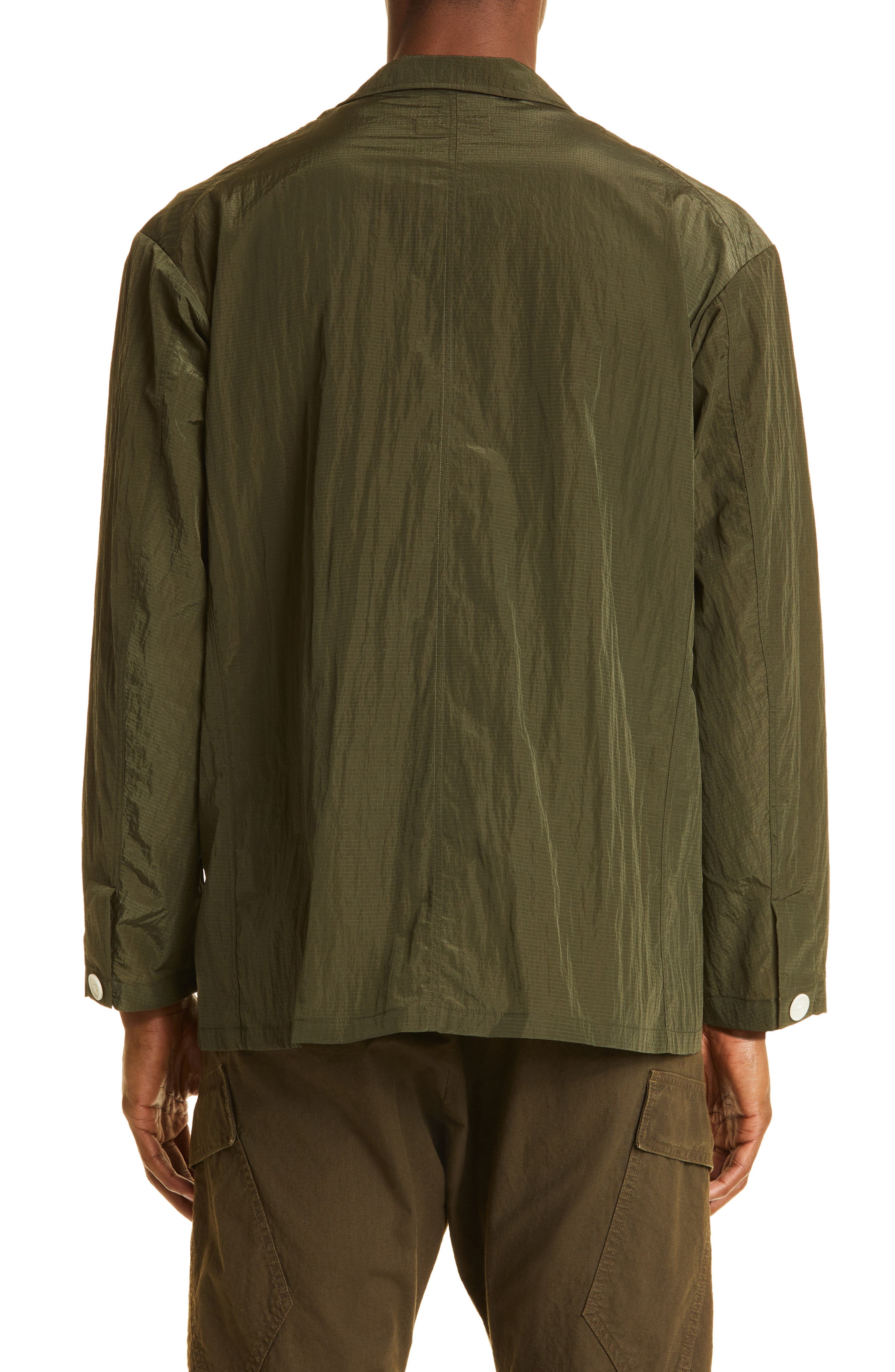 green shirt brown jacket
