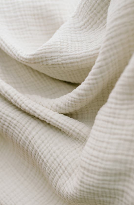 Shop Oilo Organic Cotton Muslin Throw Blanket In Eggshell