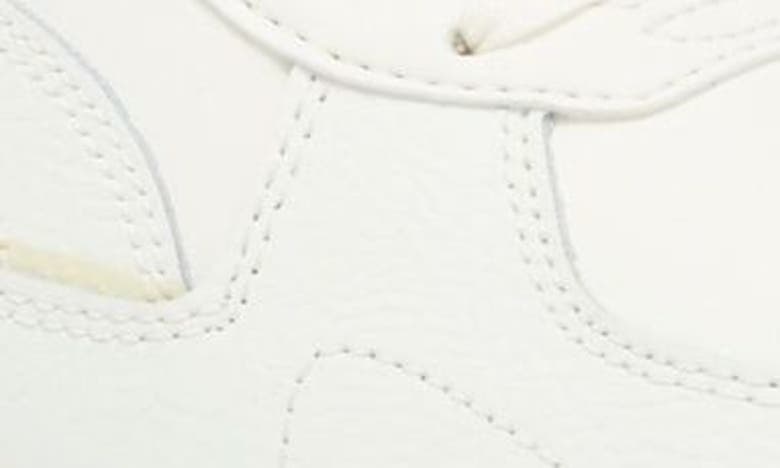 Shop Puma Graviton Sneaker In Warm White-warm Whit