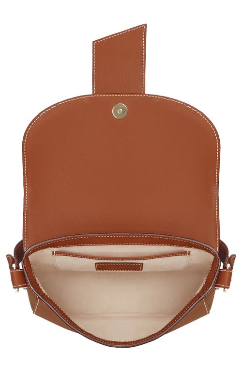 Shop Strathberry Crescent Saddle Leather Crossbody Bag In Chestnut/vanilla