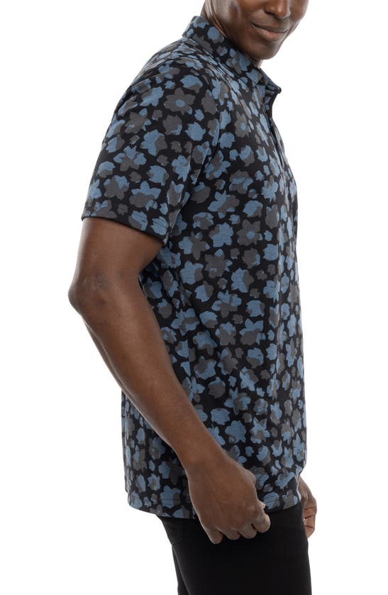 Travismathew By The Wharf Floral Print Polo In Black