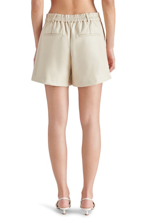 Shop Steve Madden Imelda Faux Leather Shorts In Bone