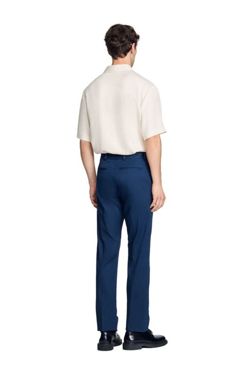 Shop Sandro Straight-leg Chinos In Dark Navy