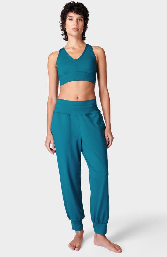 Shop Sweaty Betty Gaia Pocket Joggers In Reef Teal Blue