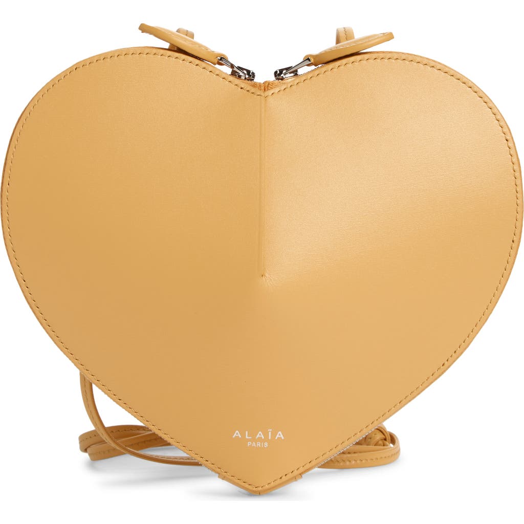 Shop Alaïa Le Coeur Leather Crossbody Bag In Citrine