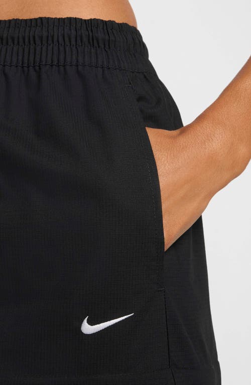 Shop Nike Essential Convertible Cargo Skirt In Black/white