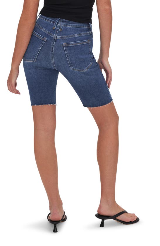 Shop Good American Always Fits Cutoff Bermuda Denim Shorts In Indigo520