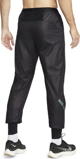 Nike Running Division Phenom Men's Storm-FIT Running Trousers. Nike CH