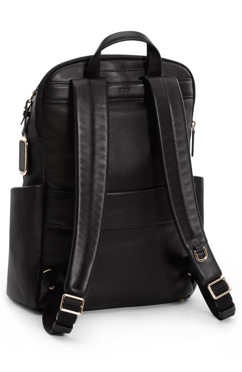 Shop Tumi Raina Leather Backpack In Black/light Gold