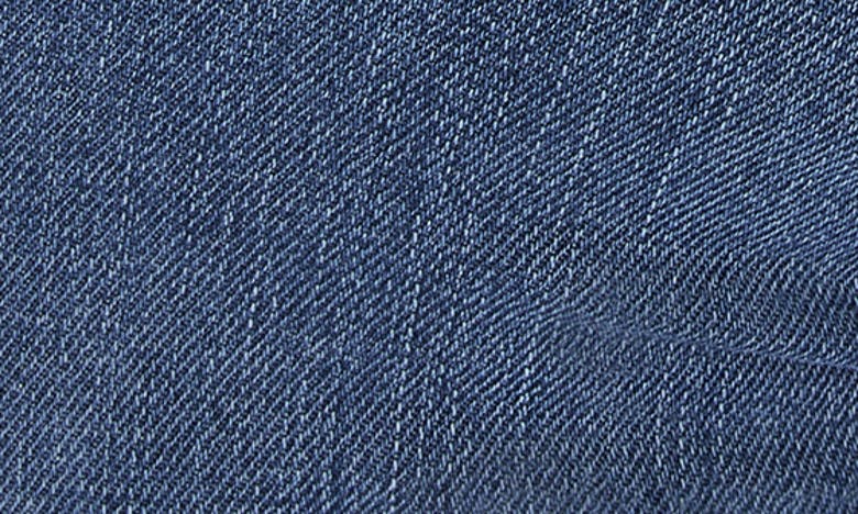 Shop Good American Good Curve Chew Hem Bootcut Jeans In Indigo631