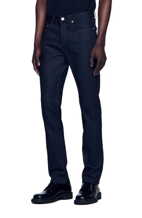 Shop Sandro Waterless Narrow Cut Jeans In Raw-denim