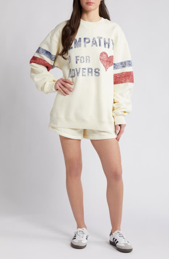 Shop The Mayfair Group Empathy Is For Lovers Graphic Sweat Shorts In Cream