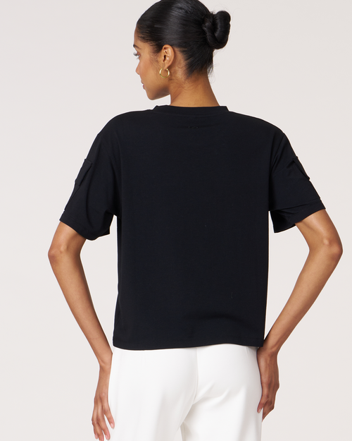 Shop Rebody Active Cargo Short Sleeve Top In Black