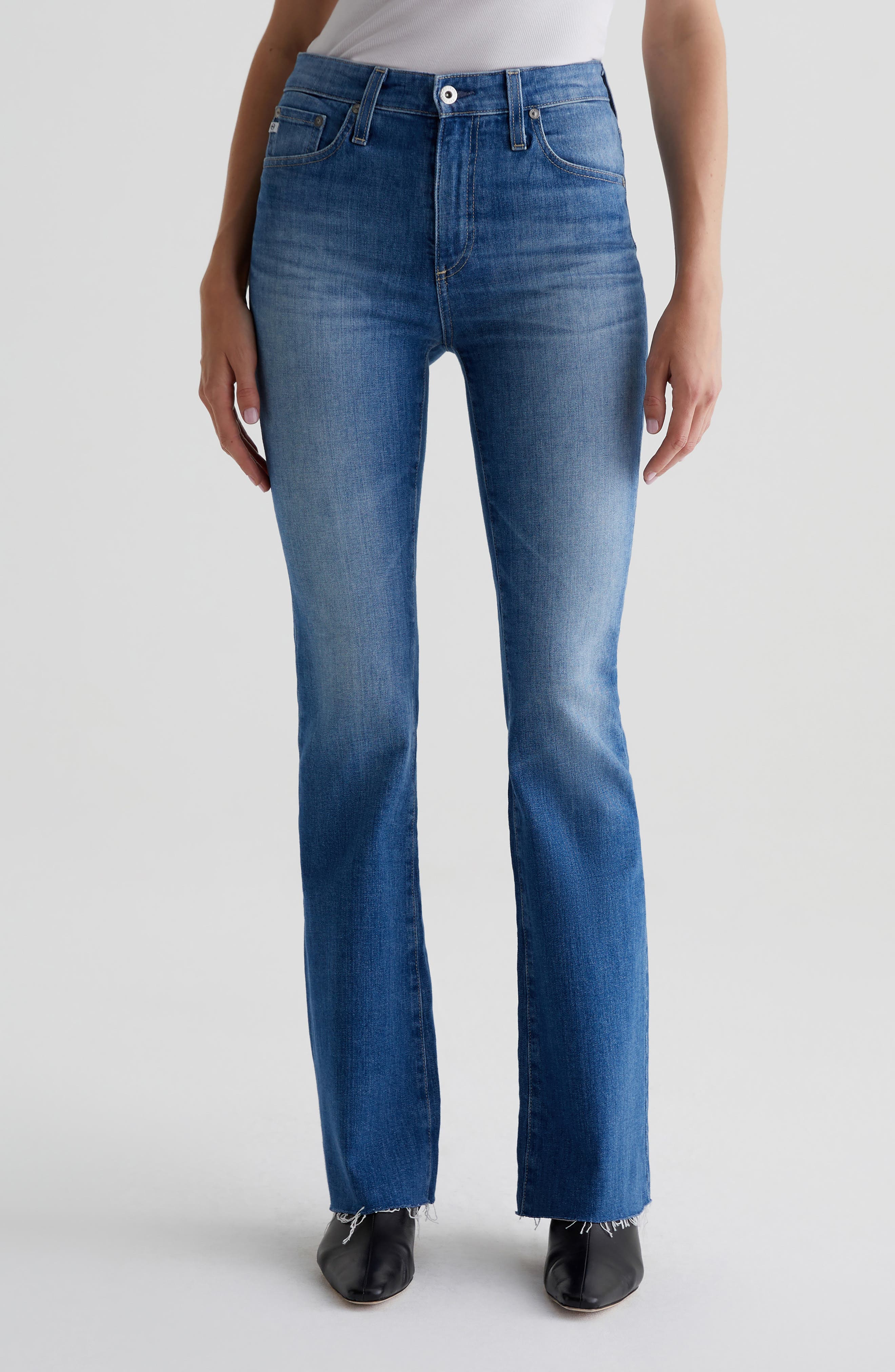 AG Farrah Raw Hem Mid Rise Bootcut Jeans in Runway 