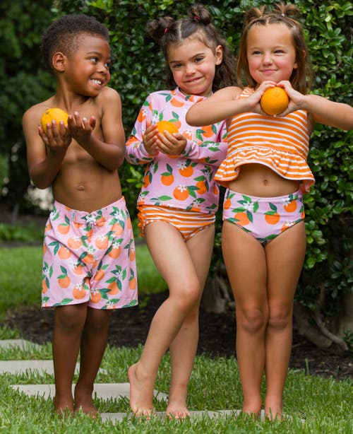 Shop Ruggedbutts Boys Upf50+ Swim Trunks In Orange You The Sweetest