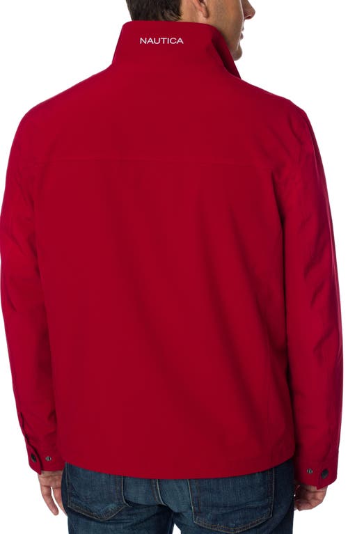 Shop Nautica Lightweight Stretch Water Resistant Golf Jacket In Red