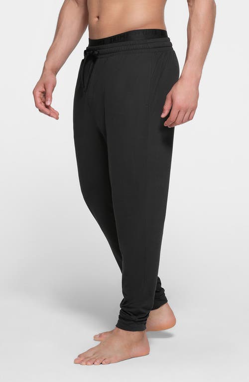 Shop Skims Outdoor Jersey Tapered Joggers In Onyx