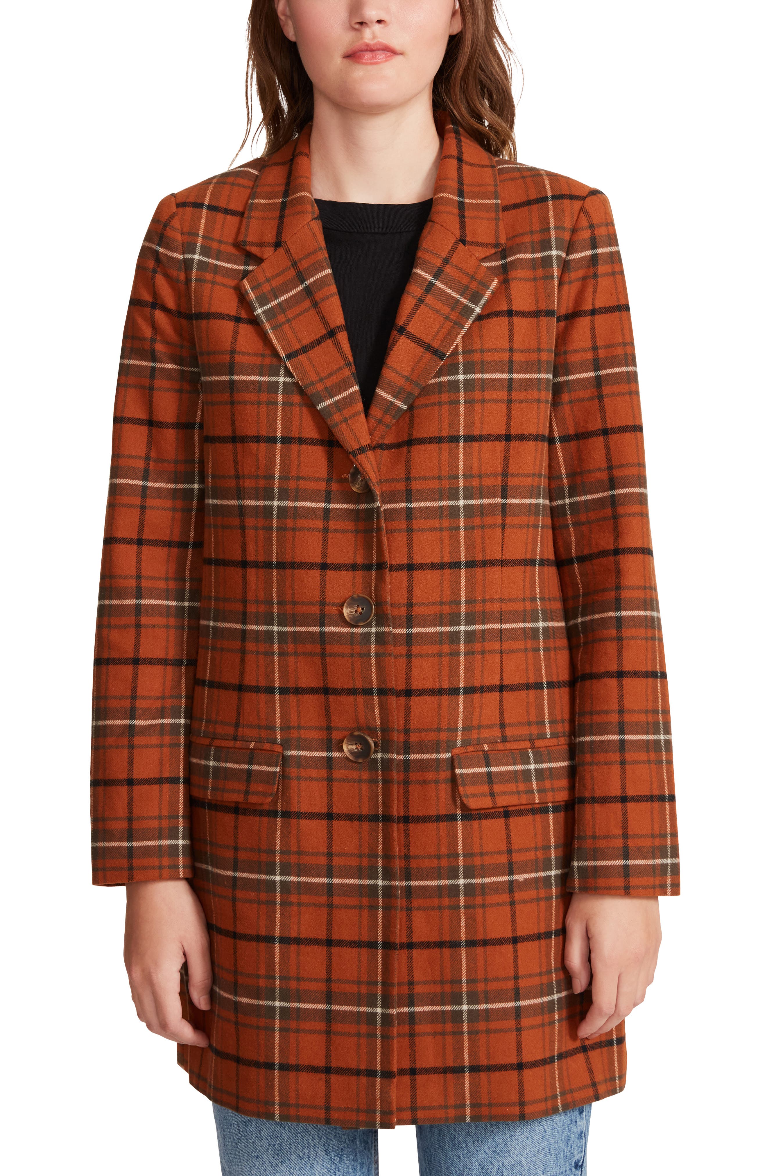 orange and brown plaid coat