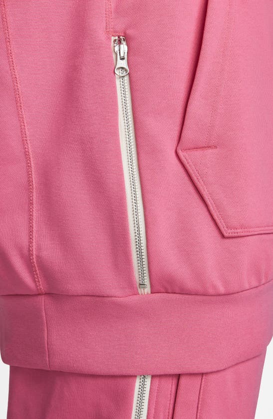 Shop Nike Dri-fit Standard Issue Hoodie Sweatshirt In Pinksicle/ Pale Ivory