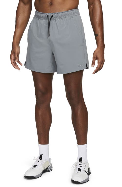Nike Men's Unlimited Dri-fit 5" Unlined Versatile Shorts In Smoke Grey/black/smoke Grey