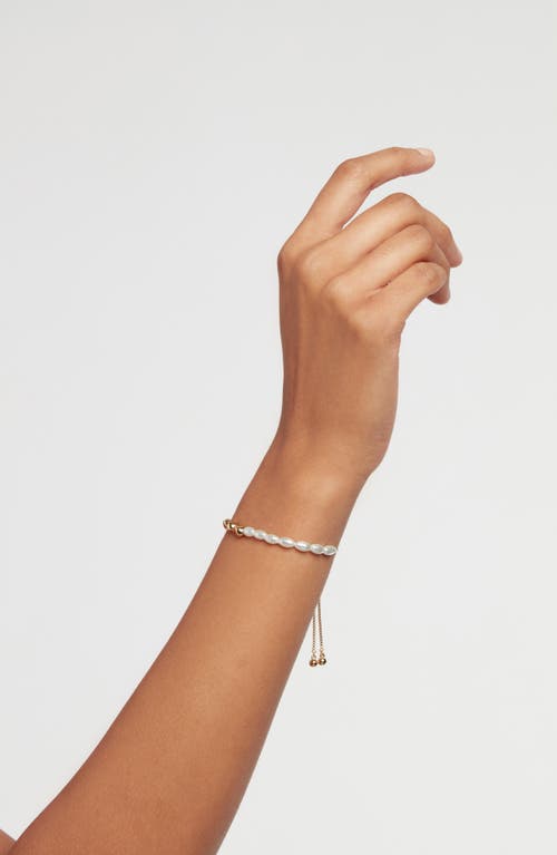 Shop Ted Baker London Inela Island Imitation Pearl Slider Bracelet In Gold Tone/pearl