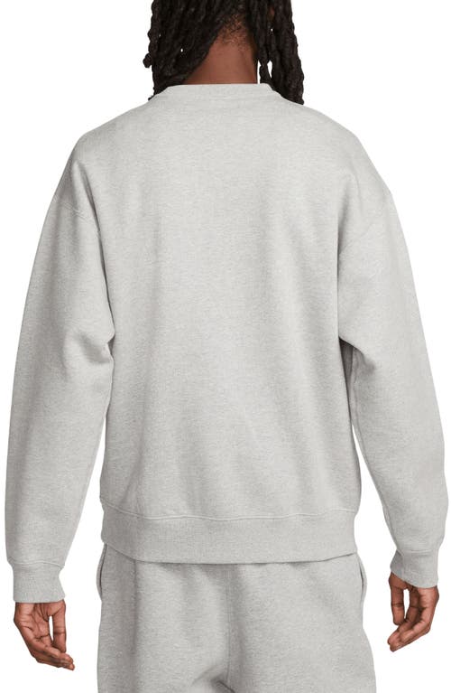 Shop Nike Solo Swoosh Oversize Crewneck Sweatshirt In Dark Grey Heather/white