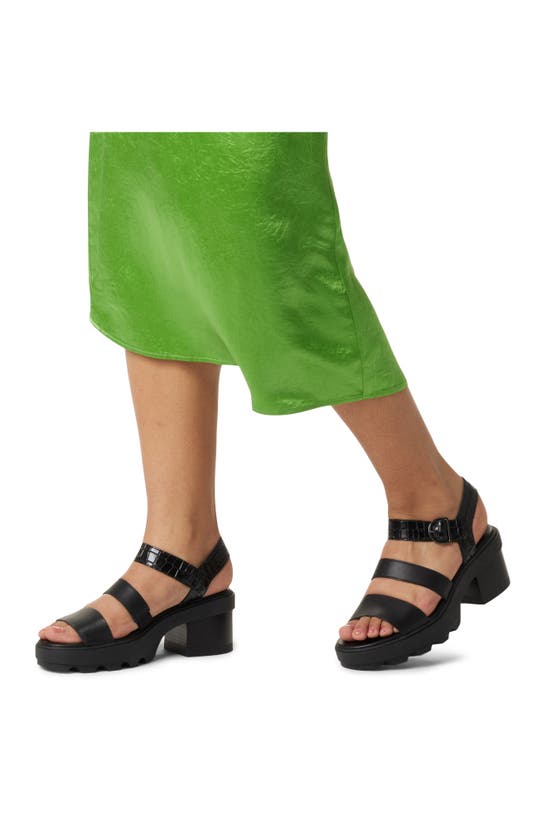 Shop Sorel Joanie Ankle Strap Platform Sandal In Black/ Black