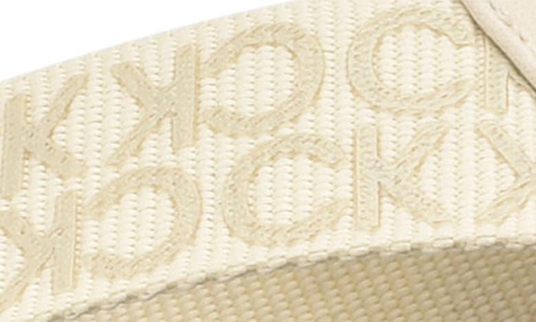 Shop Calvin Klein Caluha Flip Flop Sandal In Vanilla Logo