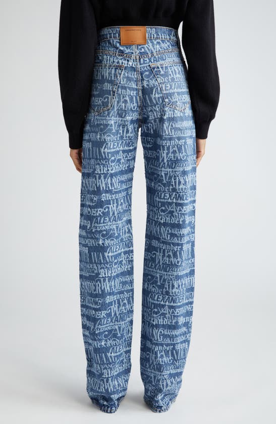 Shop Alexander Wang Ez Newsprint Logo Distressed Relaxed Straight Leg Jeans In Vintage Medium Indigo