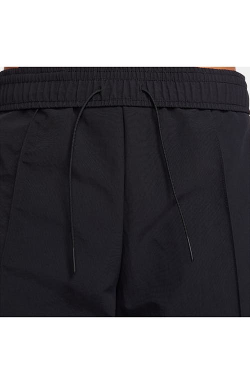 Shop Nike Wide Leg Pants In Black/white