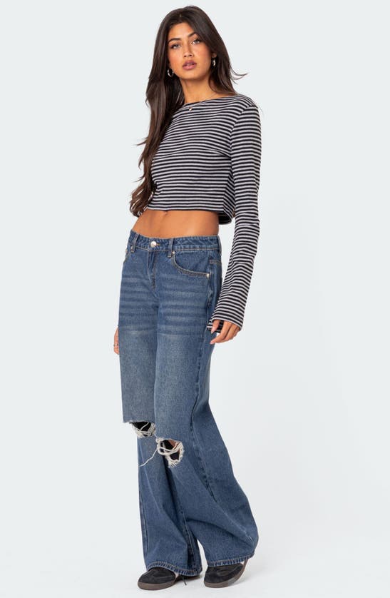 Shop Edikted Debbie Ripped Low Rise Wide Leg Jeans In Indigo-blue-raw-wash