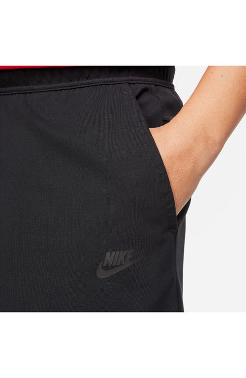 Shop Nike Lightweight Tech Knit Shorts In Black/black