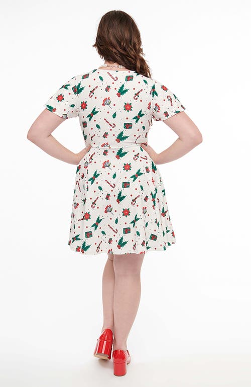 Shop Unique Vintage 1950s Poppy Flare Dress In Ivory Christmas Print