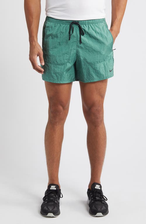 Nike Dri-fit Stride Running Division Shorts In Green