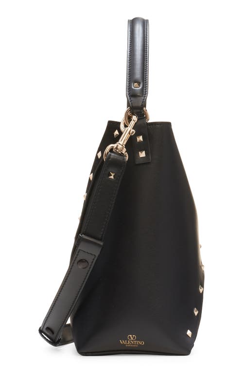 Shop Valentino Garavani Rockstud Wispy Leather & Suede Crossbody Bucket Bag In Nero