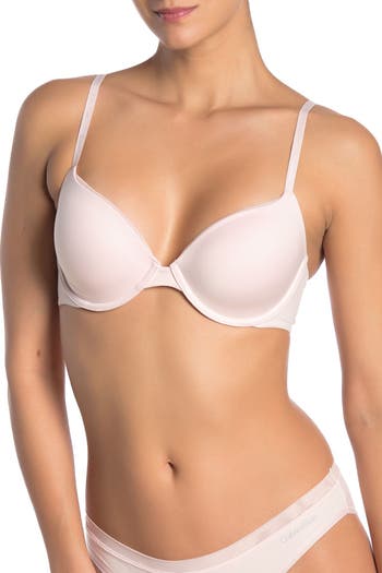 New with tags - Calvin Klein lightly lined Demi bra, 34B, in nude.