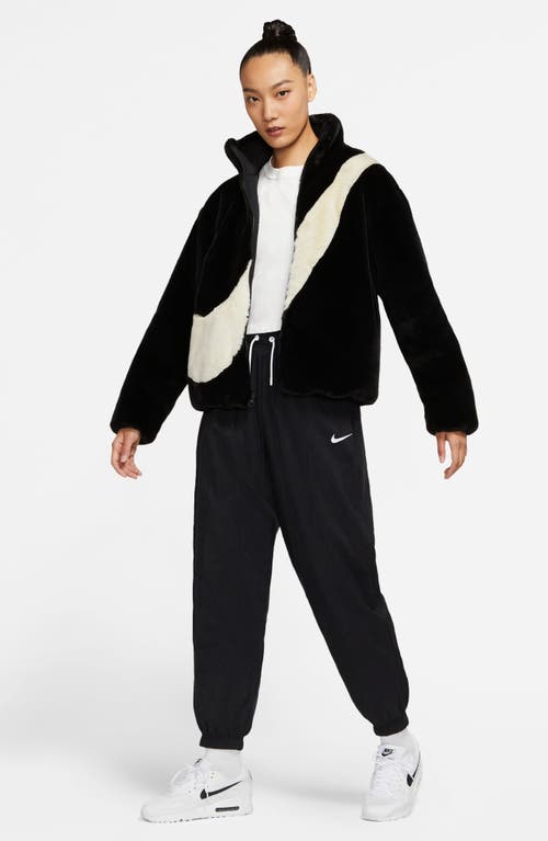 Shop Nike Sportswear Faux Fur Swoosh Jacket In Black/fossil